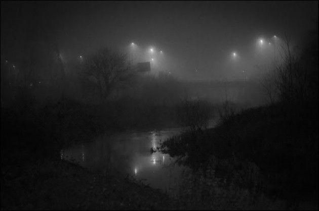 Â© Geoff Wilkinson, who writes on Wanstead Daily Photo: "Wanstead was covered in fog a couple of nights ago and because this is not a frequent occurrence, I grabbed the camera bag and instead of heading toward the High Street I went to the river Roding. I captured this mystical scene showing reflections in the river and the ghostly lights of the A406 in the background."