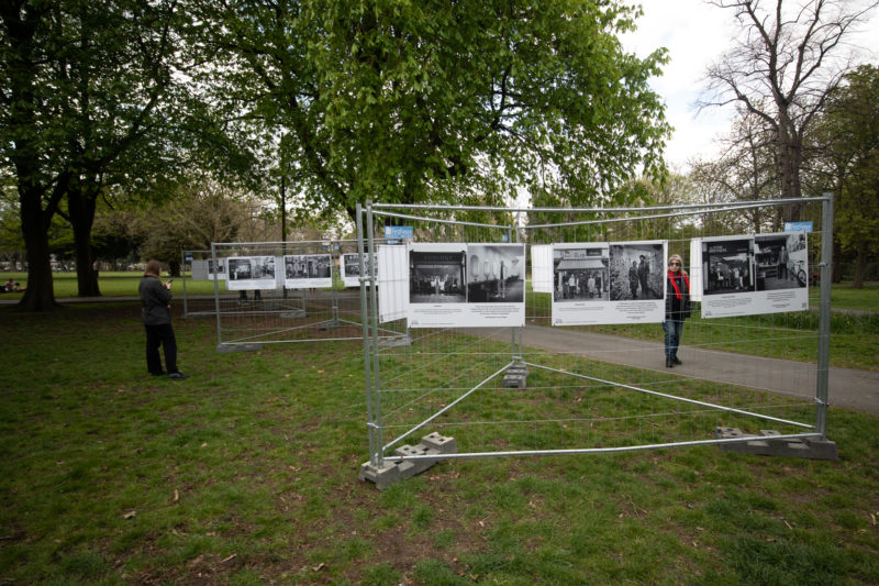 People look at the exhibition of documentary pictures by Russell Boyce titled ‘A Portrait of the High Street’ on Christ Church Green, Wanstead, in London April 13, 2022. Picture by Russell Boyce
