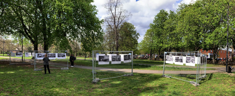 People look at the exhibition of documentary pictures by Russell Boyce titled ‘A Portrait of the High Street’ on Christ Church Green, Wanstead, in London April 13, 2022. Picture by Russell Boyce